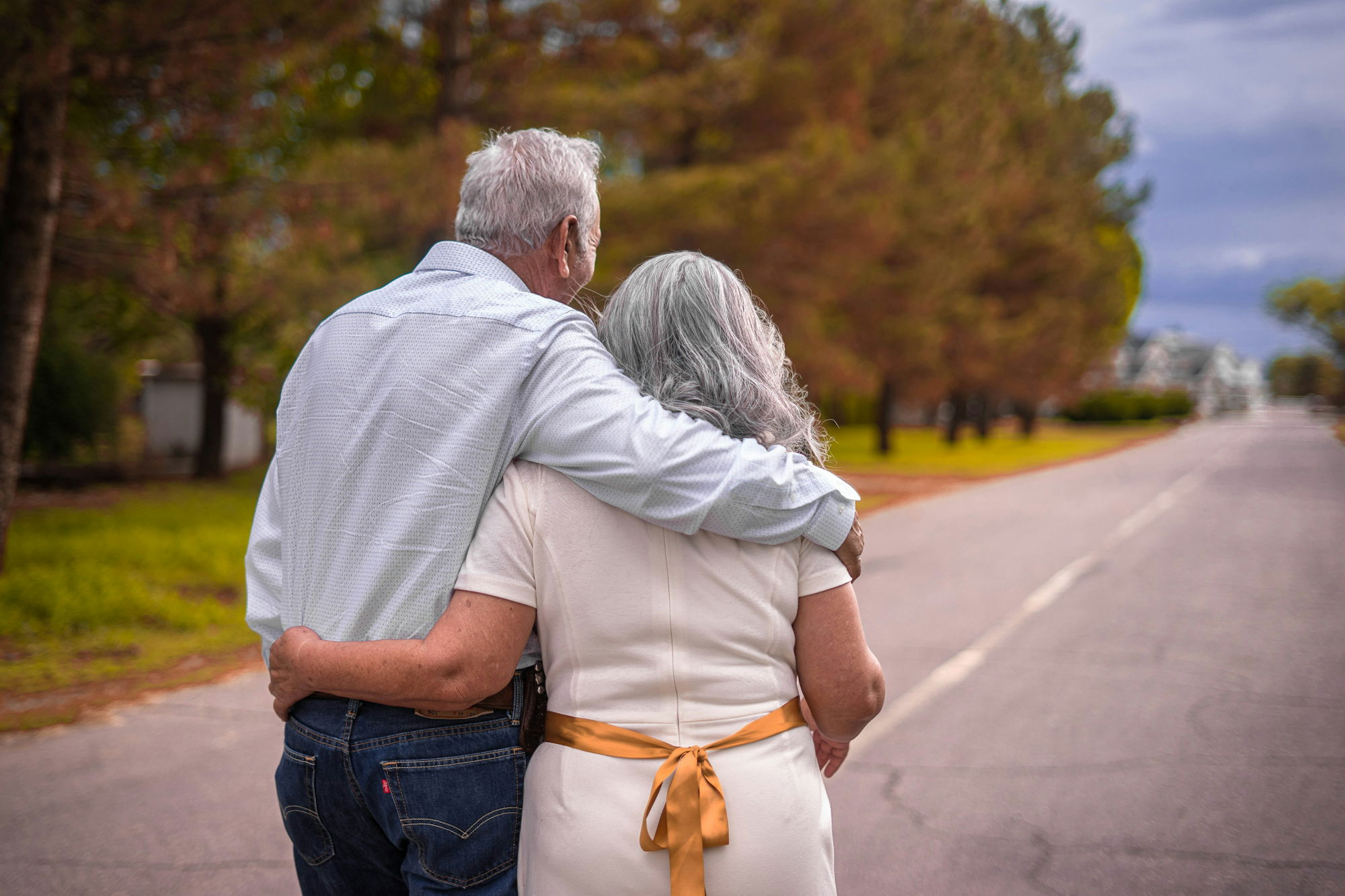 couple-kissing-on-the-road-during-daytime.jpg couple kissing on the road during daytime